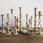 Set of 50 brass candlesticks