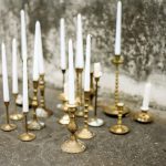 Set of 20 brass candlesticks