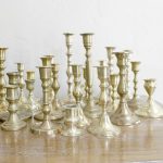 Set of 100 brass candlesticks